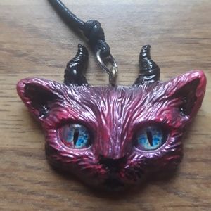 Horned kitty pendant red